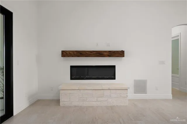 a utility room with a fireplace