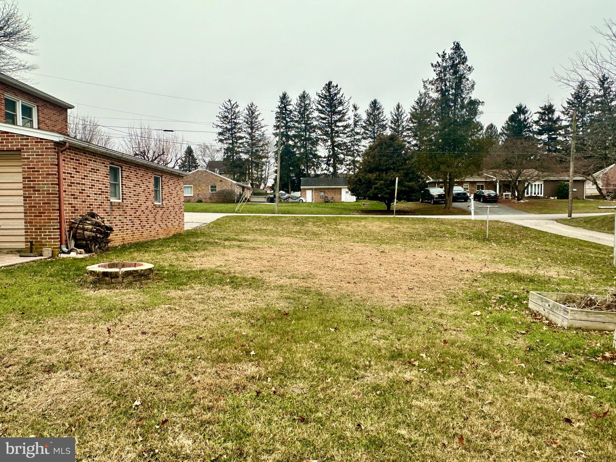 340 South Camp Street Windsor, PA 17366 - Photo 12 of 44 a view of yard with swimming pool and trees in the background