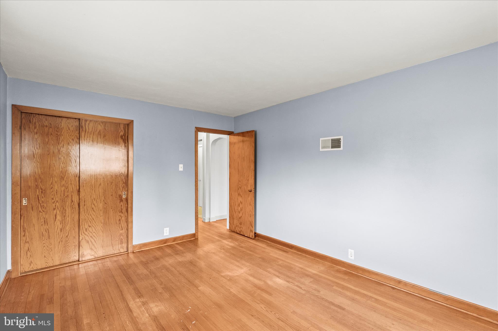 340 South Camp Street Windsor, PA 17366 - Photo 23 of 44 a view of an empty room with wooden floor and closet