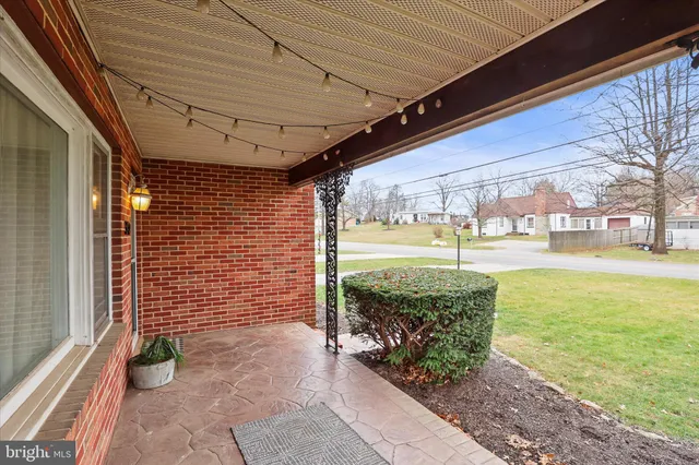 a view of a backyard of the house