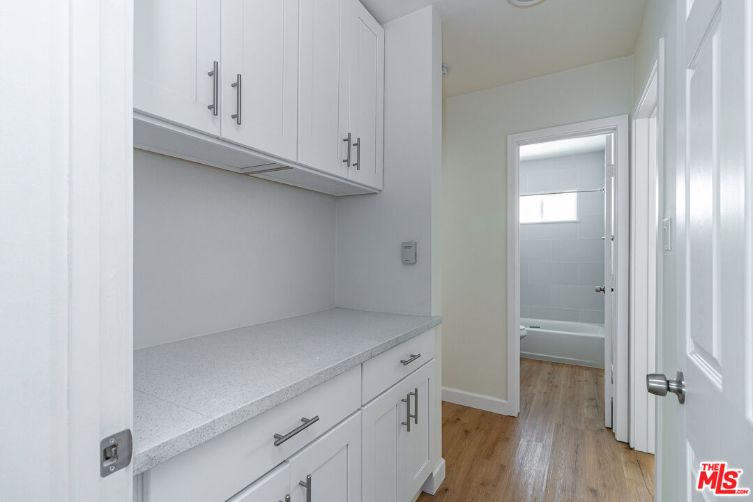 12572 Washington Boulevard, Unit 2 Los Angeles, CA 90066 - Photo 12 of 19 a view of cabinets and wooden floor