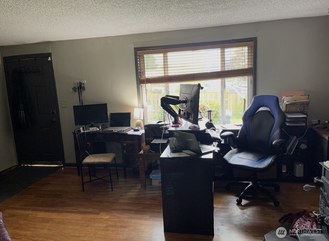 1104 Dibb Street Bremerton, WA 98310 - Photo 3 of 15 a view of a workspace with furniture and a window