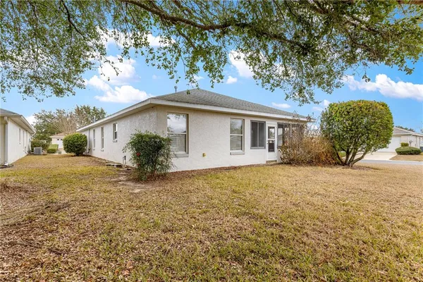 a house with trees in front of it