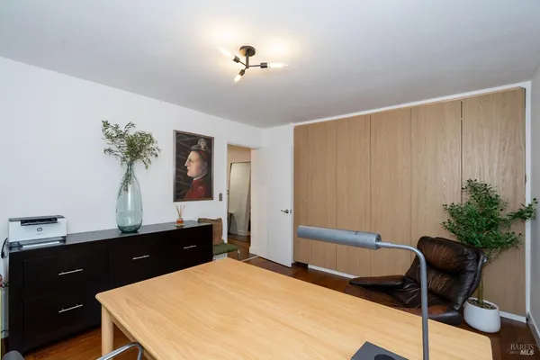 a workspace with furniture and window