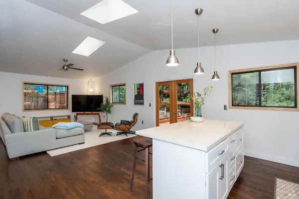 a view of living room with furniture and a flat screen tv