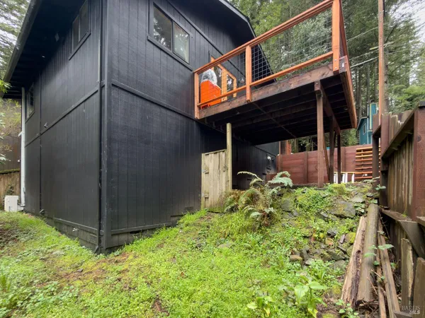 a backyard of a house with lots of green space