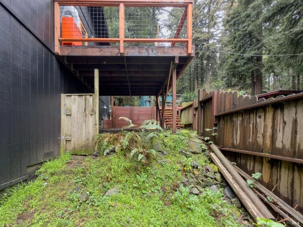 a view of a backyard with a tub