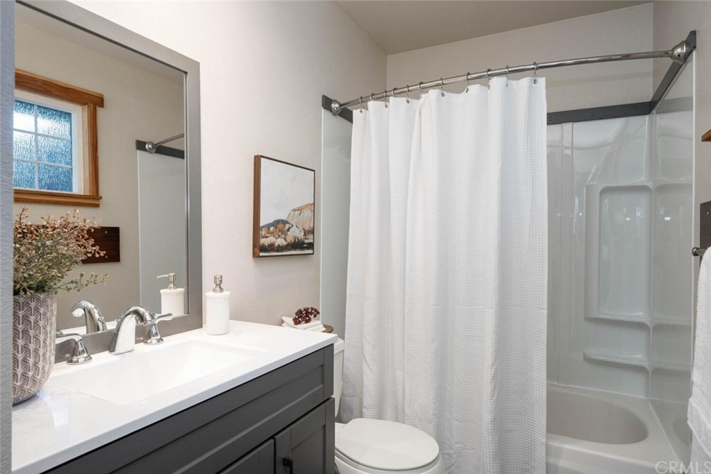 4312 Stable Lane Chico, CA 95973 - Photo 24 of 50 a bathroom with a sink and a mirror