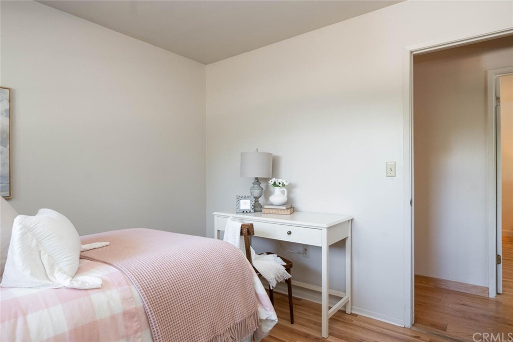 4312 Stable Lane Chico, CA 95973 - Photo 29 of 50 a bedroom with a bed and a table in it