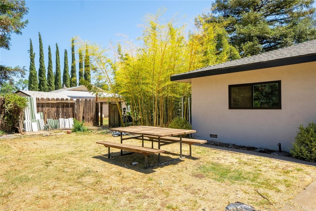 4312 Stable Lane Chico, CA 95973 - Photo 38 of 50 a swimming pool with outdoor seating and yard
