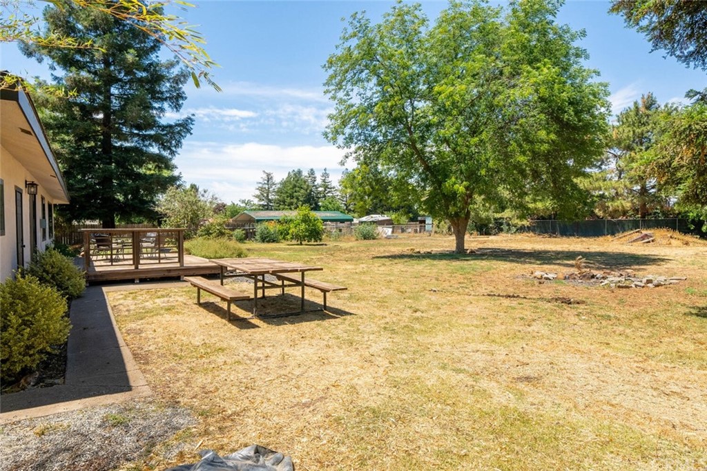 4312 Stable Lane Chico, CA 95973 - Photo 40 of 50 a swimming pool with outdoor seating and yard