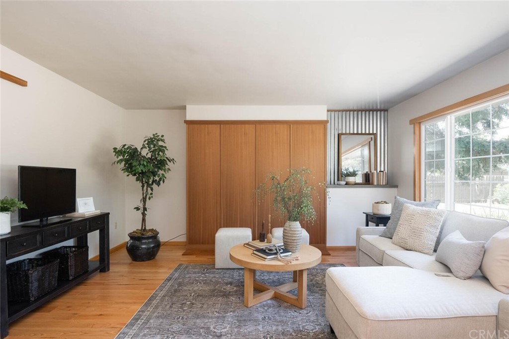 4312 Stable Lane Chico, CA 95973 - Photo 6 of 50 a living room with furniture and a flat screen tv