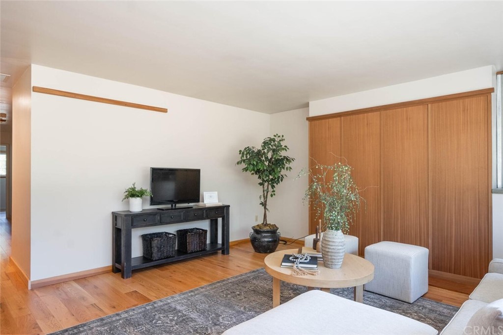 4312 Stable Lane Chico, CA 95973 - Photo 7 of 50 a living room with furniture a fireplace and a flat screen tv