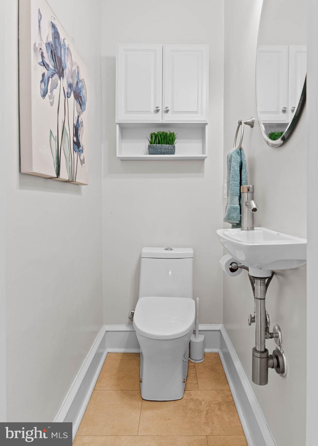 32 Chatham Road Ardmore, PA 19003 - Photo 17 of 29 a bathroom with a toilet and a sink