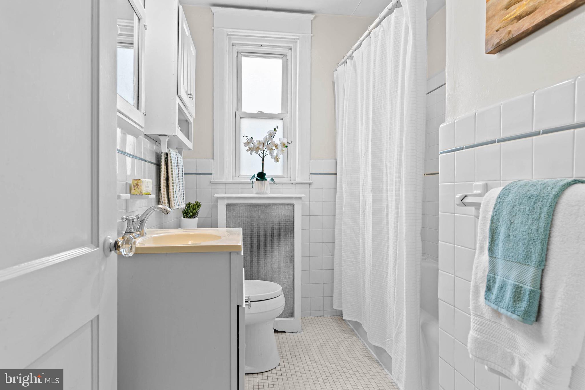 32 Chatham Road Ardmore, PA 19003 - Photo 21 of 29 a bathroom with a sink toilet and shower