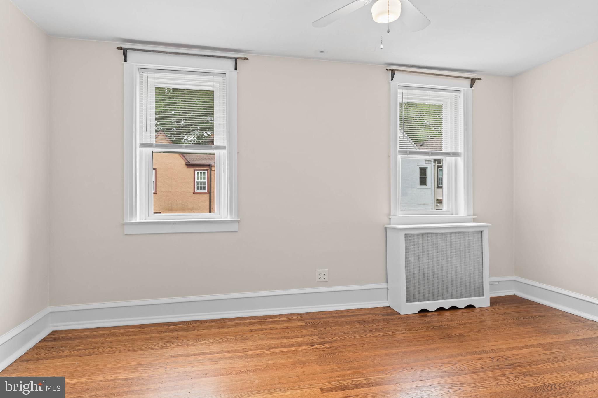 32 Chatham Road Ardmore, PA 19003 - Photo 23 of 29 a view of an empty room with wooden floor and a window