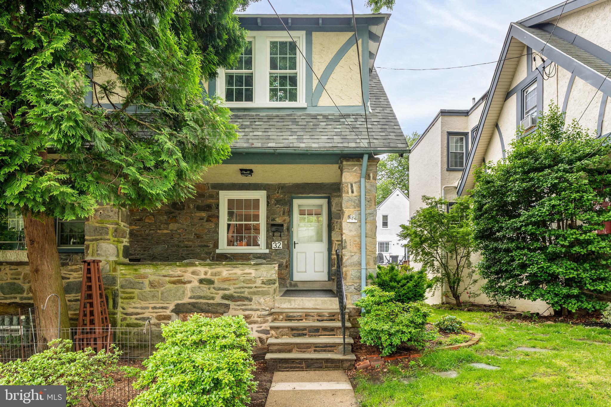 32 Chatham Road Ardmore, PA 19003 - Photo 3 of 29 a front view of a house with garden