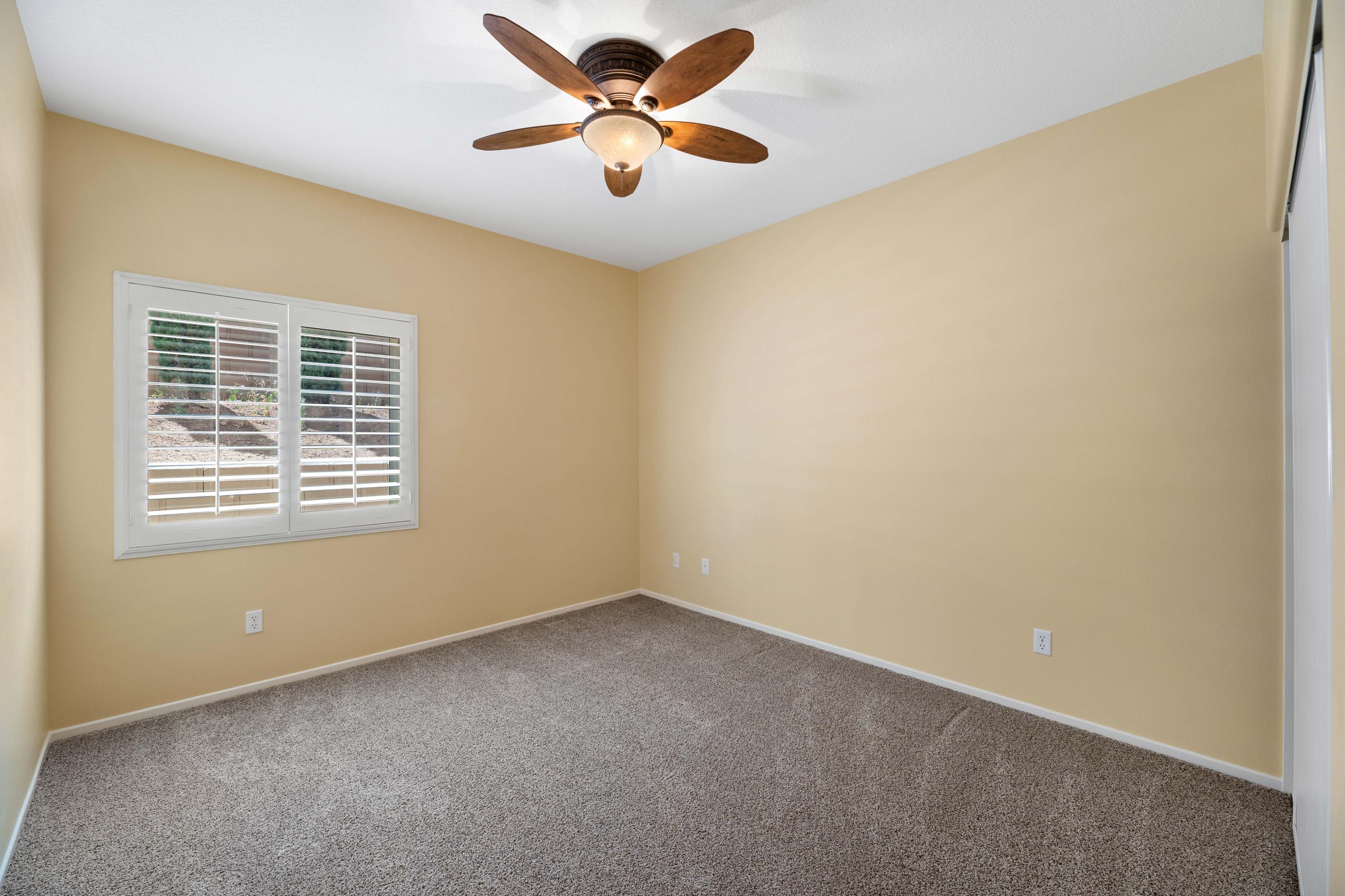 40451 Snake Lane Palmdale, CA 93551 - Photo 13 of 25 a view of an empty room with a window