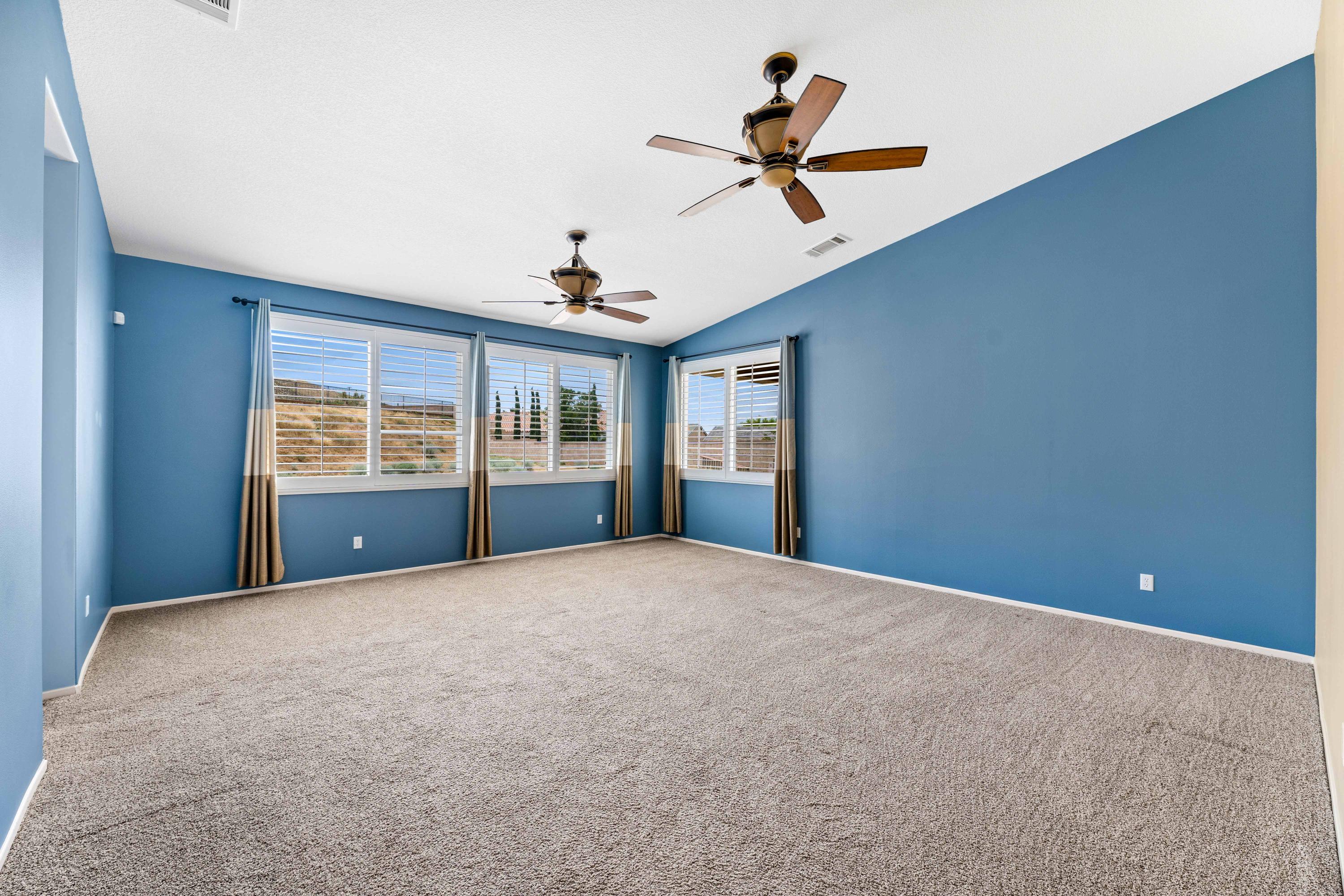 40451 Snake Lane Palmdale, CA 93551 - Photo 20 of 25 a view of an empty room with a window