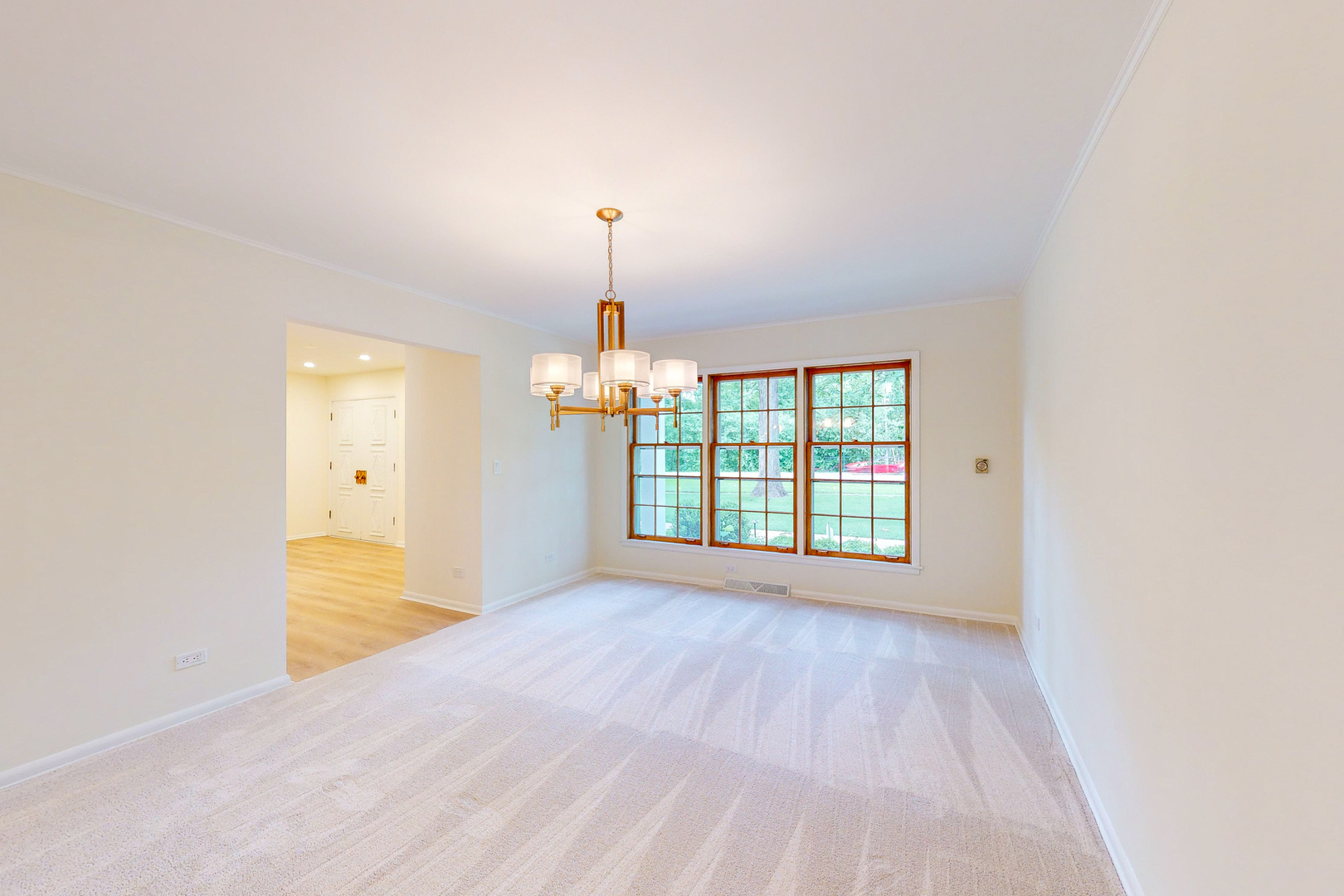2100 Burr Oak Drive Glenview, IL 60025 - Photo 12 of 38 a view of an empty room with a window
