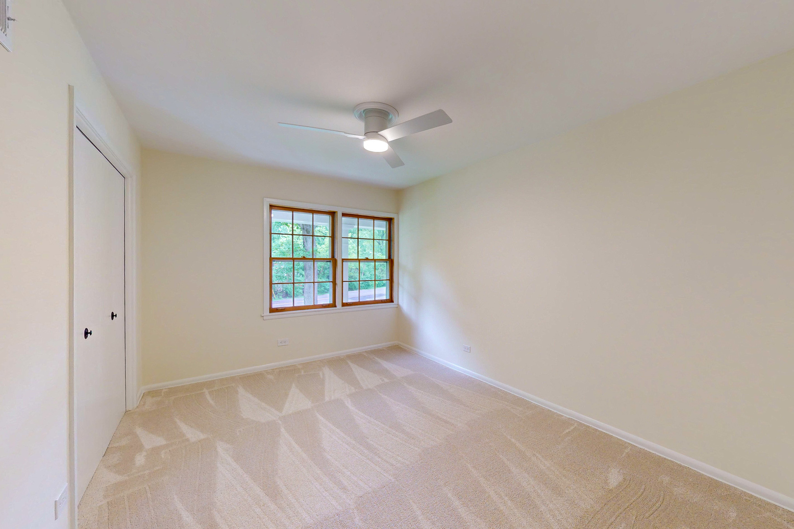 2100 Burr Oak Drive Glenview, IL 60025 - Photo 25 of 38 a view of an empty room with a window