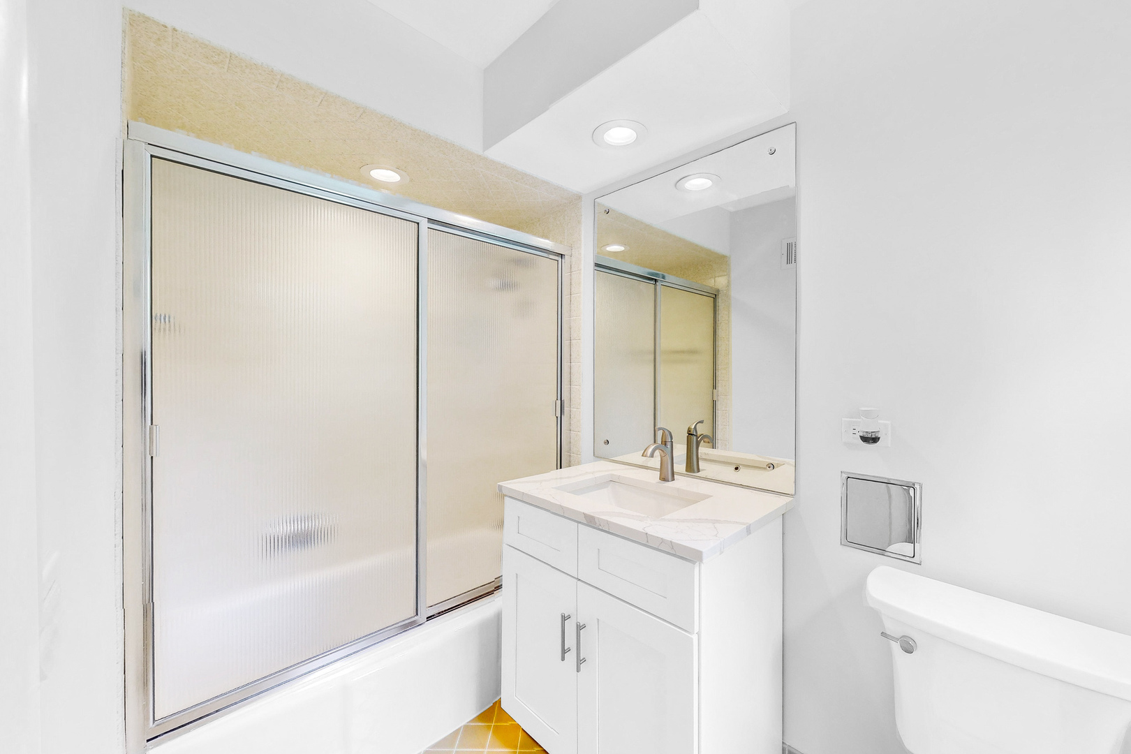 2100 Burr Oak Drive Glenview, IL 60025 - Photo 27 of 38 a bathroom with a sink mirror vanity and toilet