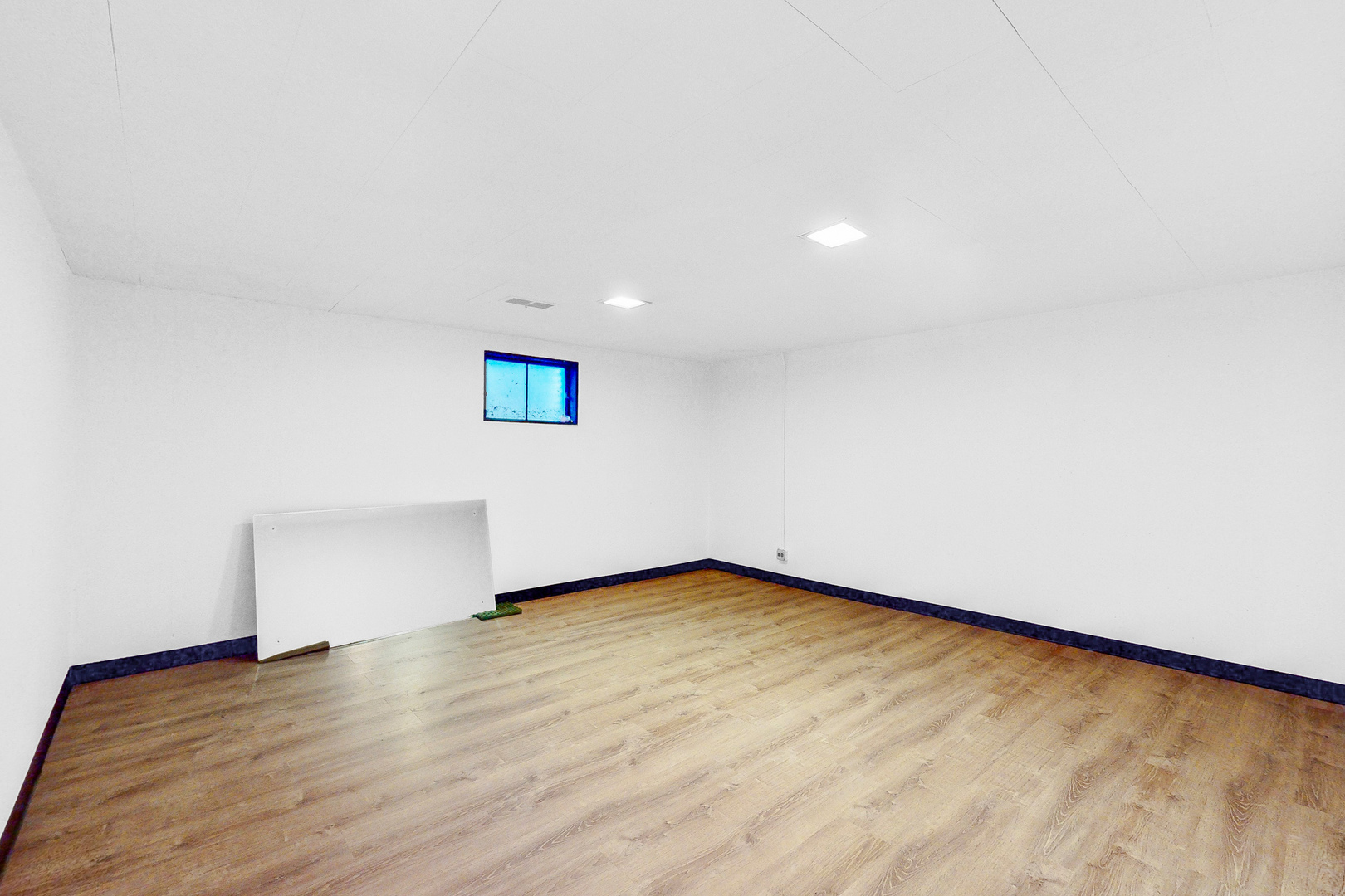 2100 Burr Oak Drive Glenview, IL 60025 - Photo 34 of 38 a view of an empty room with wooden floor and a window
