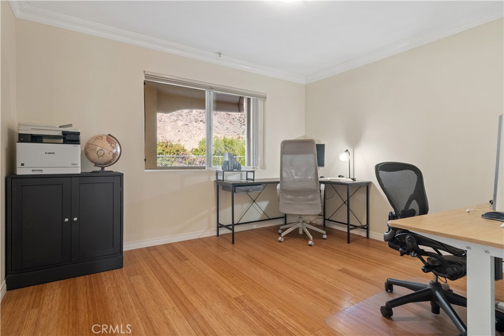 6221 Monterey Road, Unit 304 Highland Park, CA 90042 - Photo 16 of 27 a view of a workspace with furniture and a window