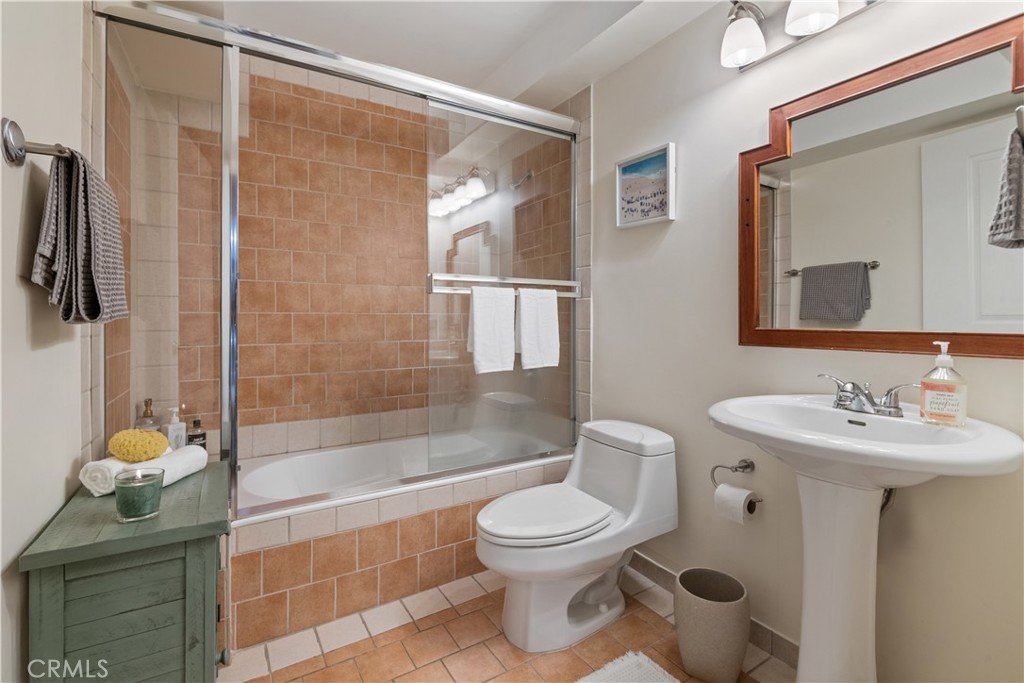6221 Monterey Road, Unit 304 Highland Park, CA 90042 - Photo 17 of 27 a bathroom with a sink toilet and shower