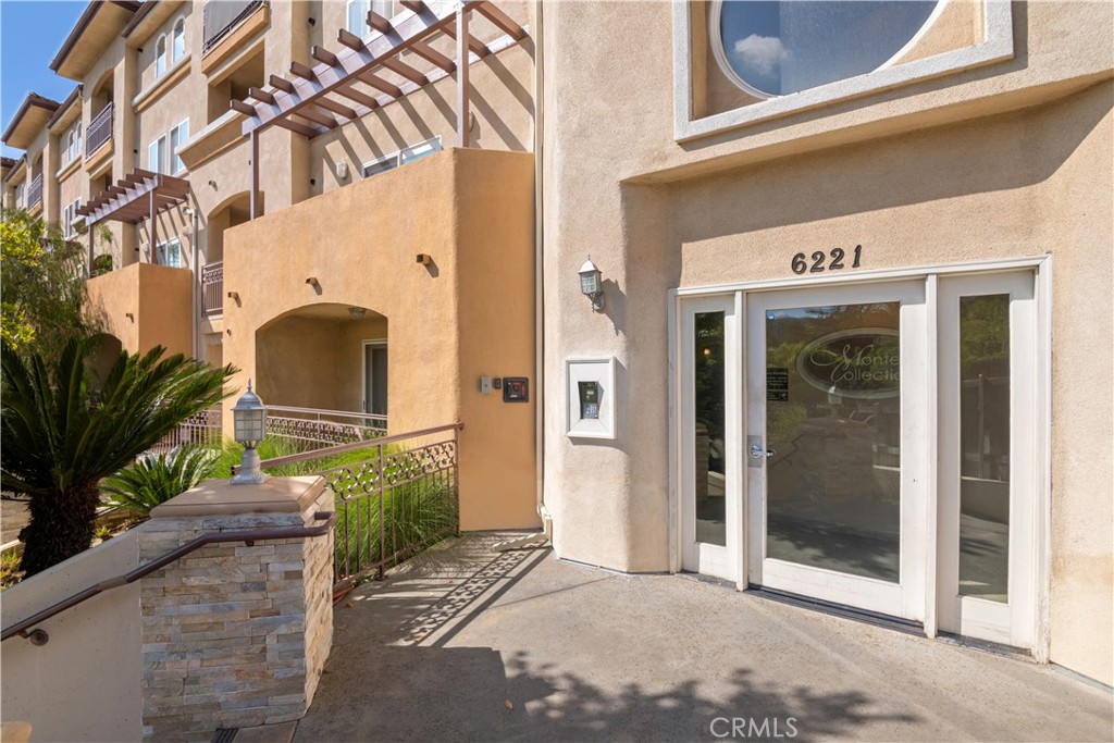 6221 Monterey Road, Unit 304 Highland Park, CA 90042 - Photo 2 of 27 a front view of a building with entryway