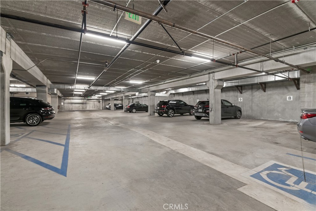 6221 Monterey Road, Unit 304 Highland Park, CA 90042 - Photo 24 of 27 a view of parking garage with cars