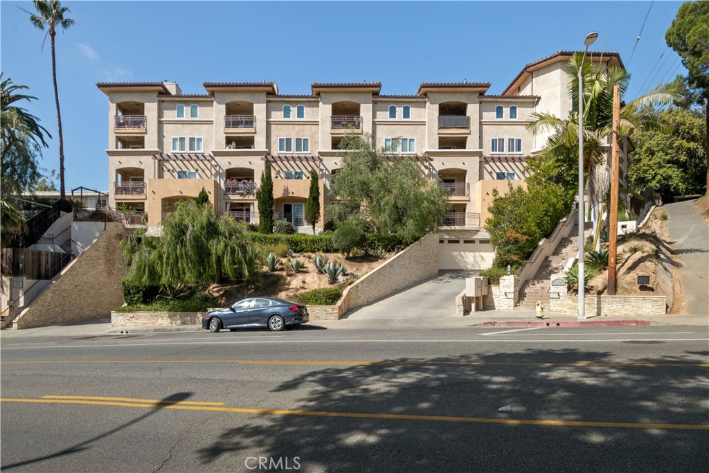 6221 Monterey Road, Unit 304 Highland Park, CA 90042 - Photo 26 of 27 a view of a building with a street