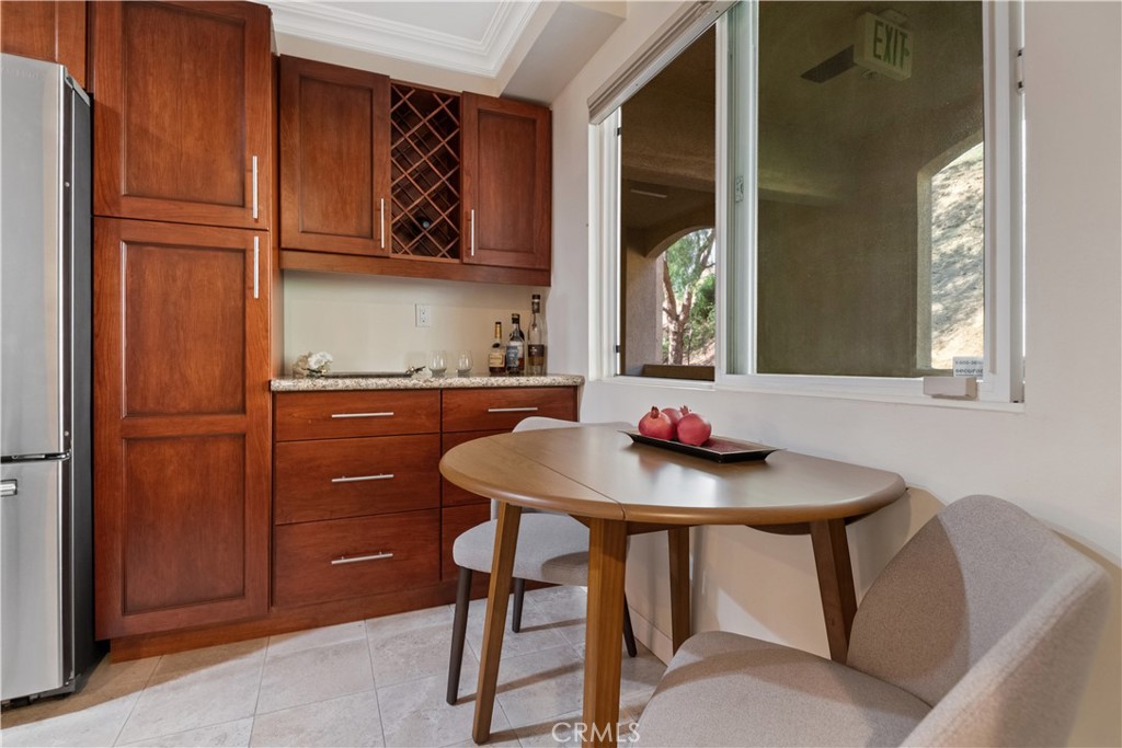 6221 Monterey Road, Unit 304 Highland Park, CA 90042 - Photo 7 of 27 a view of a dining room with furniture and window