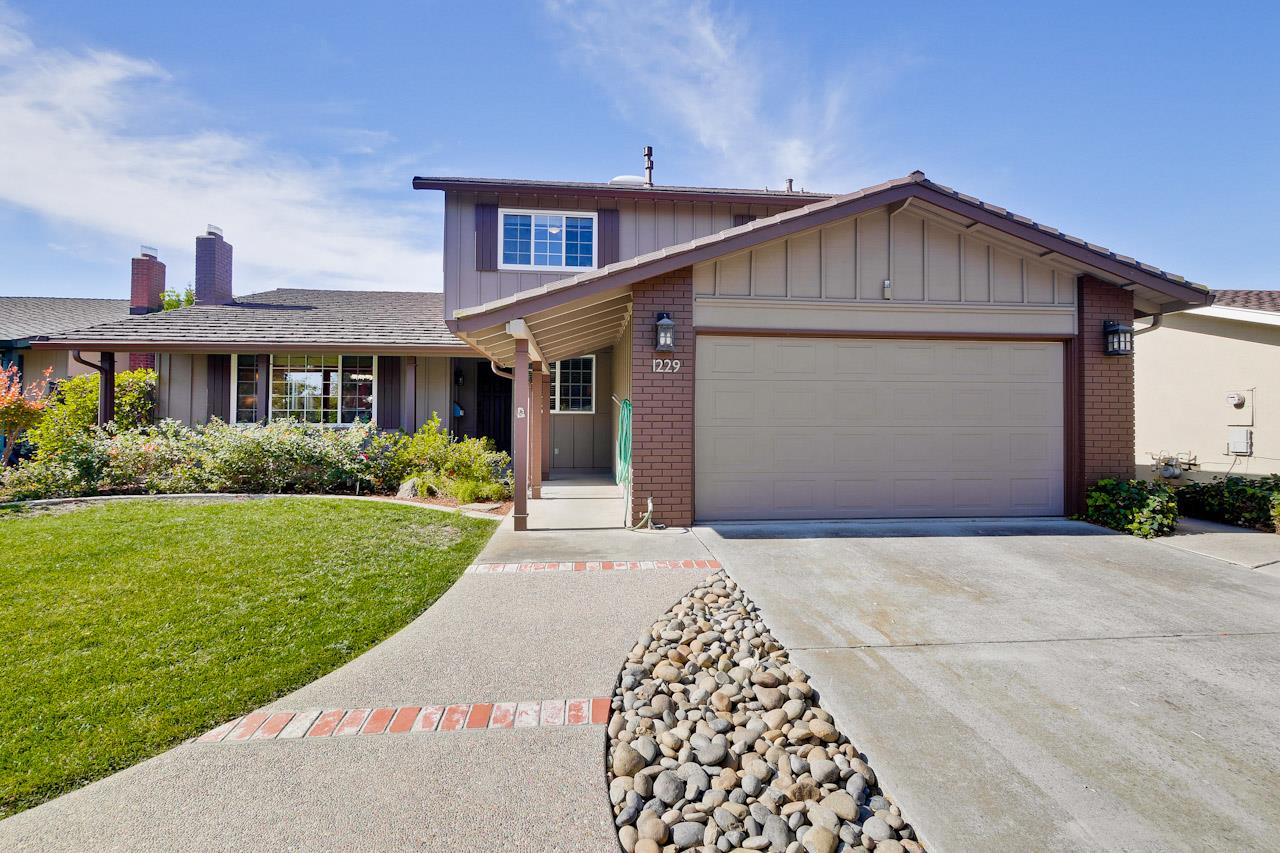 1229 Rousseau Drive Sunnyvale, CA 94087 - Photo 2 of 37 a front view of house with yard