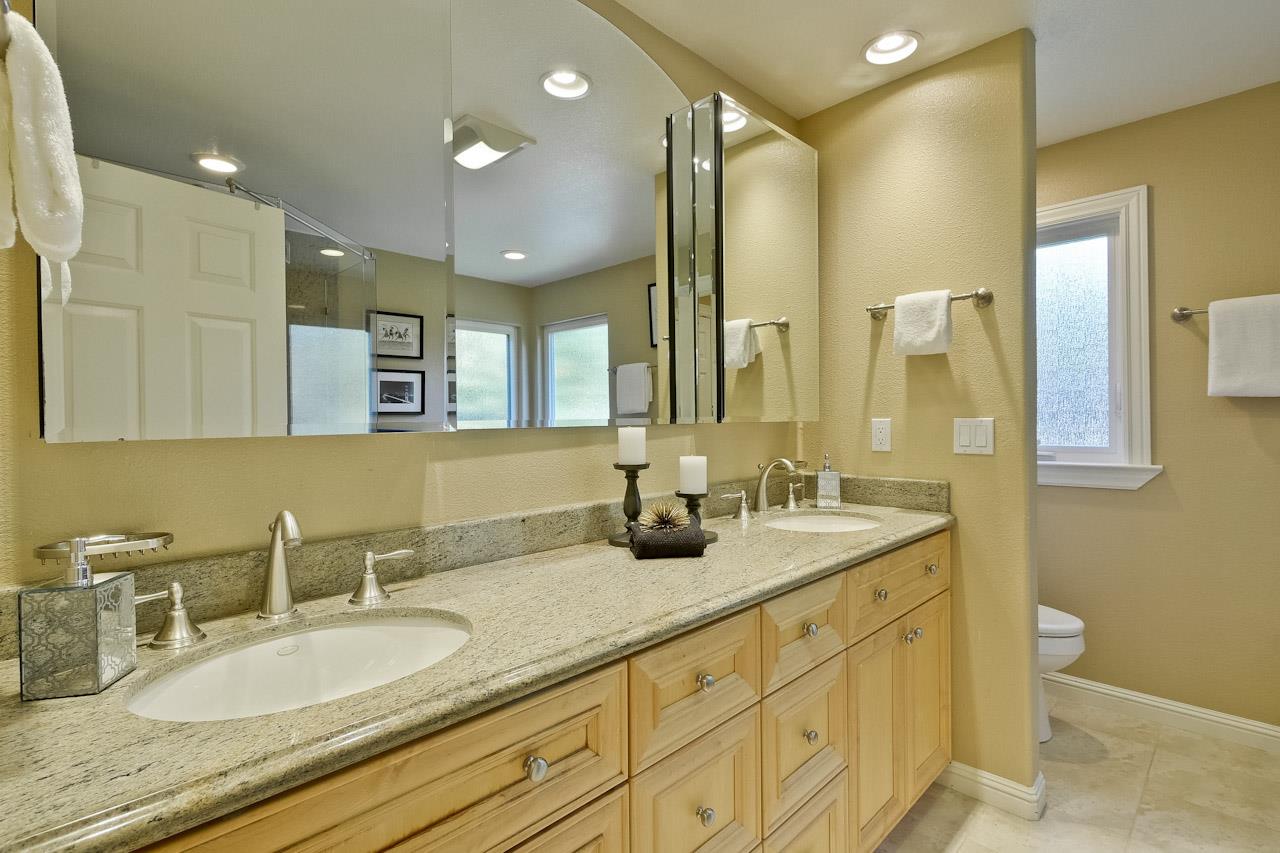 1229 Rousseau Drive Sunnyvale, CA 94087 - Photo 25 of 37 a bathroom with double vanity sinks double vanity and a mirror