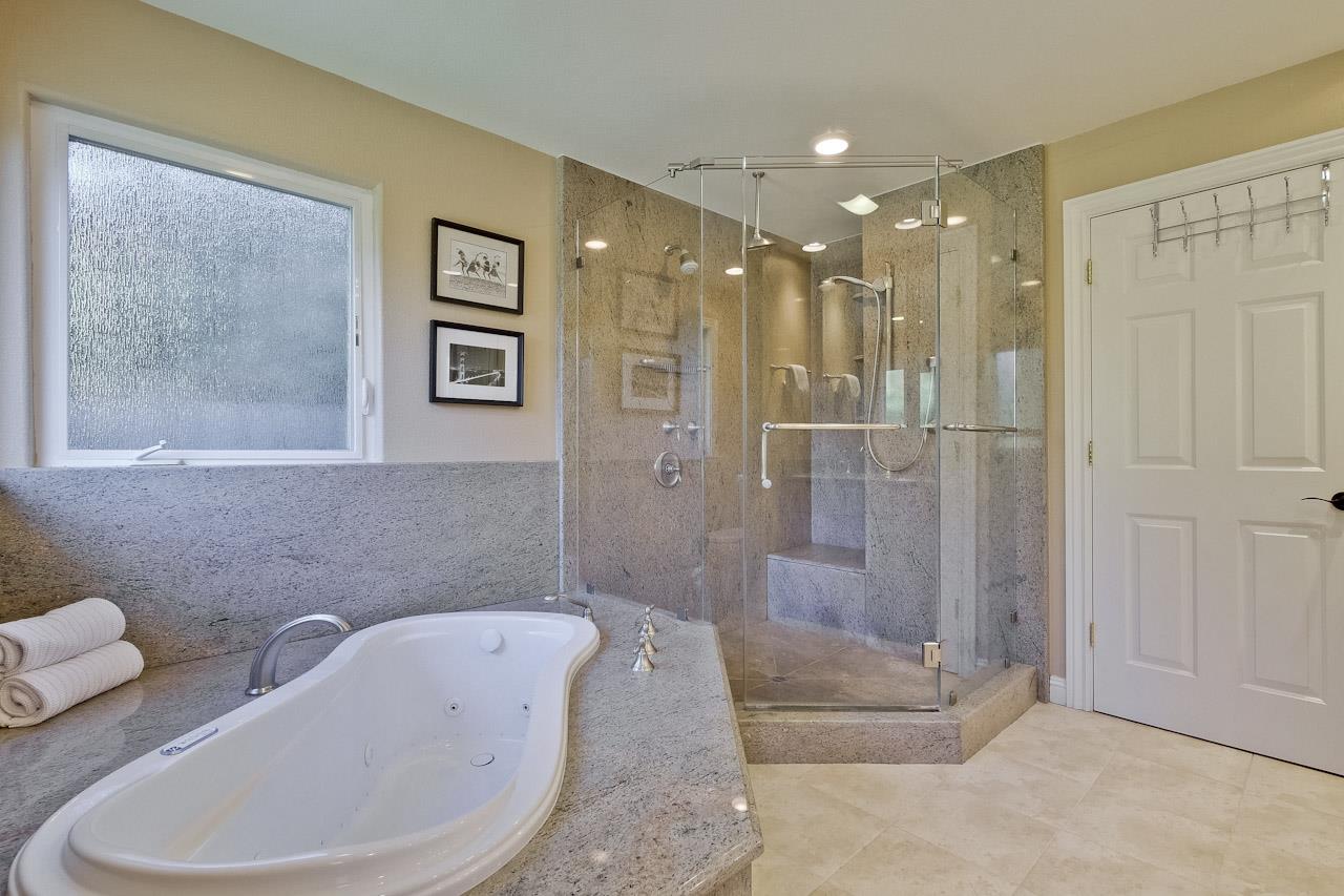1229 Rousseau Drive Sunnyvale, CA 94087 - Photo 26 of 37 a bathroom with a bathtub and a shower