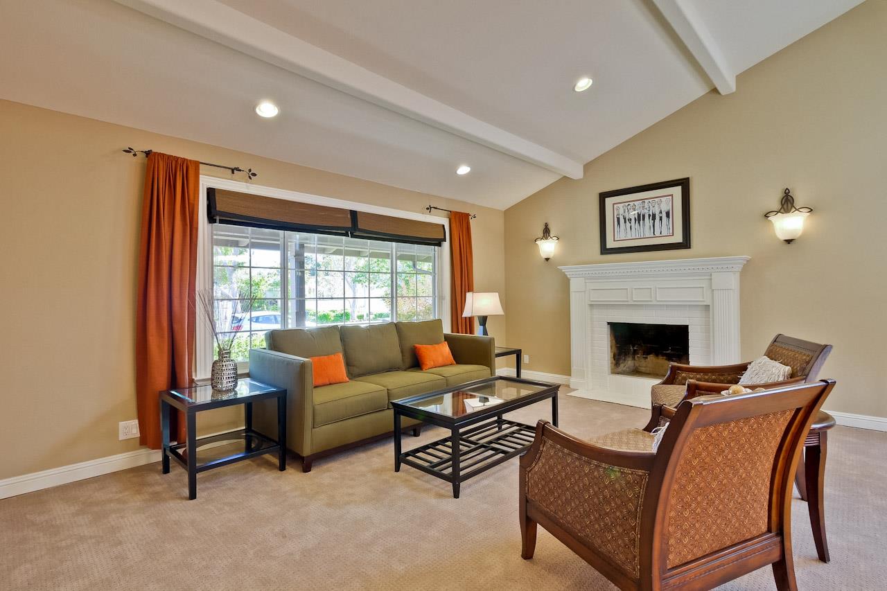 1229 Rousseau Drive Sunnyvale, CA 94087 - Photo 6 of 37 a living room with furniture and a fireplace