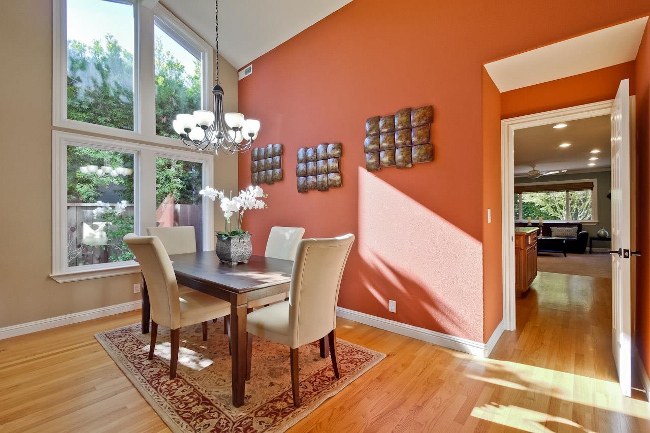 1229 Rousseau Drive Sunnyvale, CA 94087 - Photo 7 of 37 a dining room with furniture wooden floor and a rug