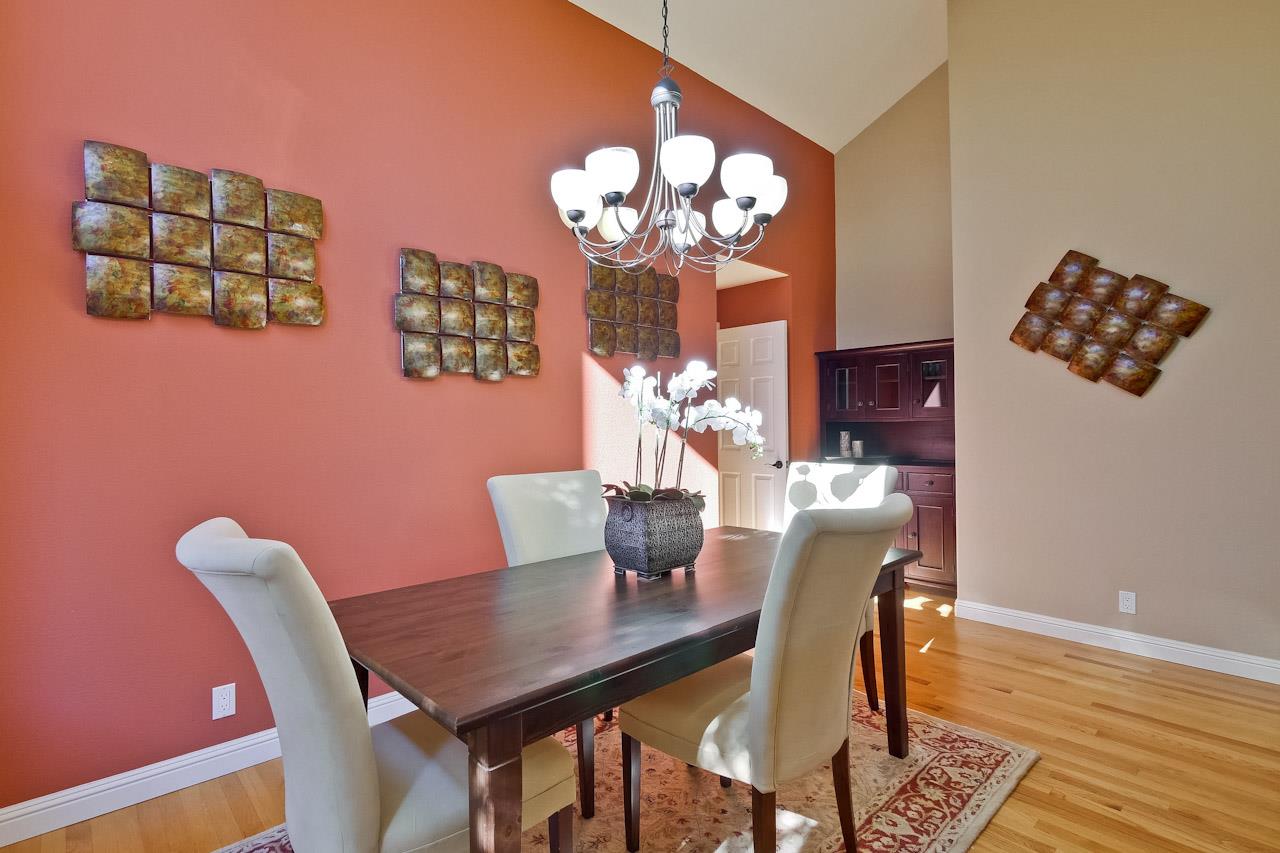 1229 Rousseau Drive Sunnyvale, CA 94087 - Photo 8 of 37 a view of a dining room with furniture a chandelier and wooden floor