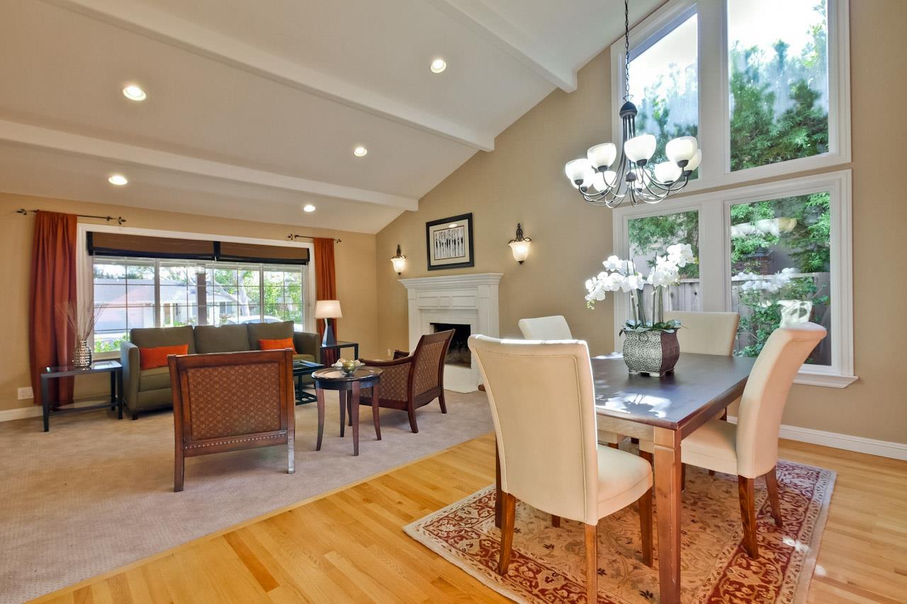 1229 Rousseau Drive Sunnyvale, CA 94087 - Photo 9 of 37 a view of a dining room with furniture a chandelier and wooden floor