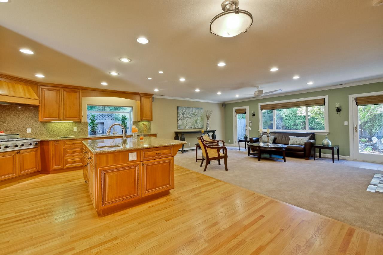 1229 Rousseau Drive Sunnyvale, CA 94087 - Photo 10 of 37 a large kitchen with stainless steel appliances lots of counter space and furniture