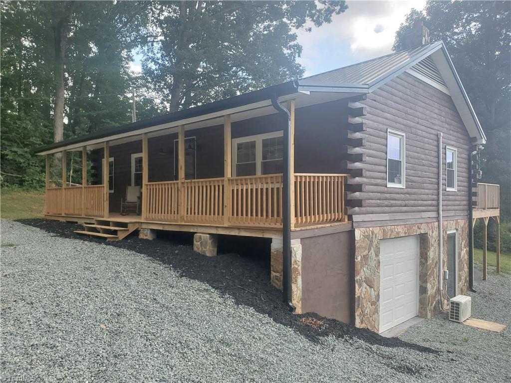 1404 Wright Country Road Ramseur, NC 27316 - Photo 1 of 31 Log Cabin Front