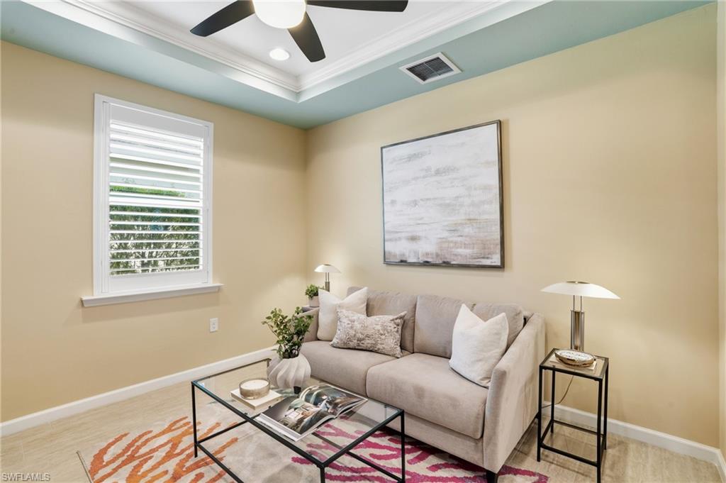 10520 Tidewater Key Boulevard Estero, FL 33928 - Photo 14 of 50 a living room with furniture and a window