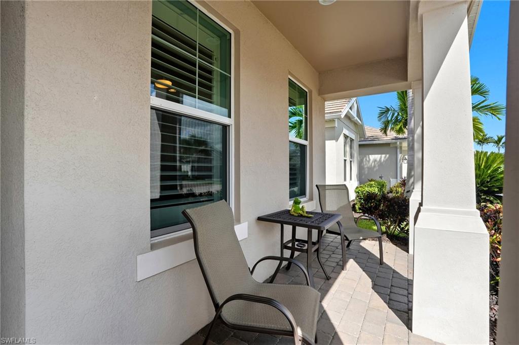 10520 Tidewater Key Boulevard Estero, FL 33928 - Photo 2 of 50 a view of a dining room with furniture and front door