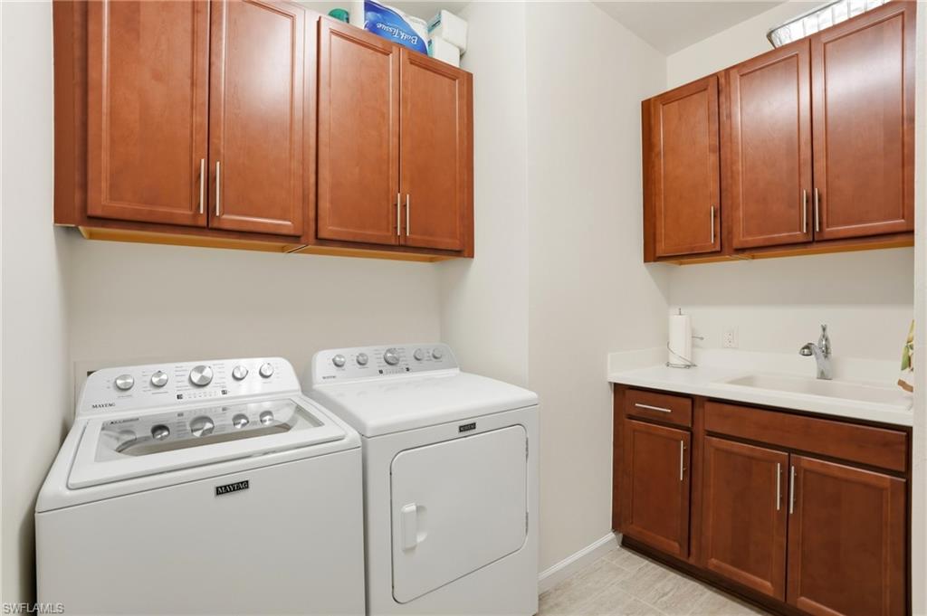 10520 Tidewater Key Boulevard Estero, FL 33928 - Photo 25 of 50 a utility room with dryer and washer