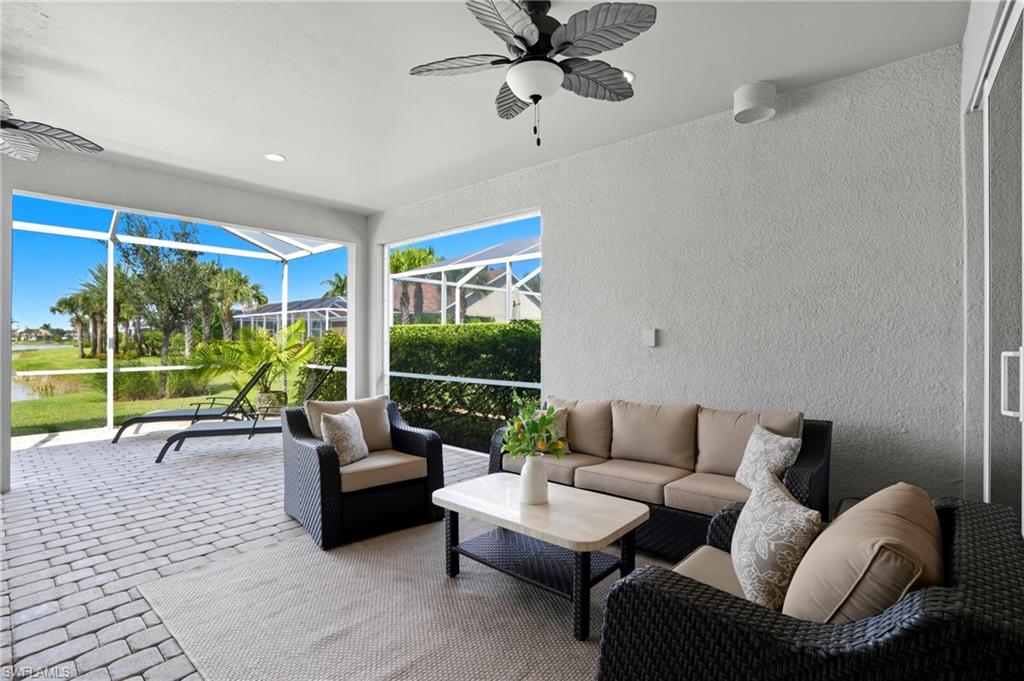 10520 Tidewater Key Boulevard Estero, FL 33928 - Photo 26 of 50 a living room with furniture and a large window