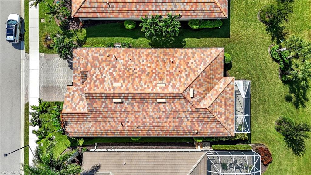 10520 Tidewater Key Boulevard Estero, FL 33928 - Photo 31 of 50 a view of a building with a bench