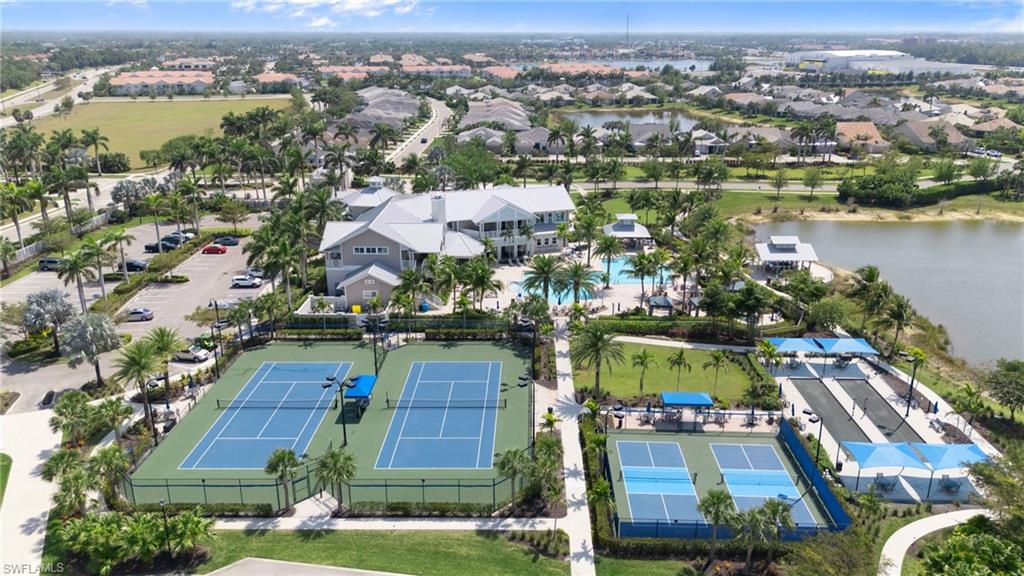 10520 Tidewater Key Boulevard Estero, FL 33928 - Photo 48 of 50 an aerial view of residential houses with outdoor space and lake view
