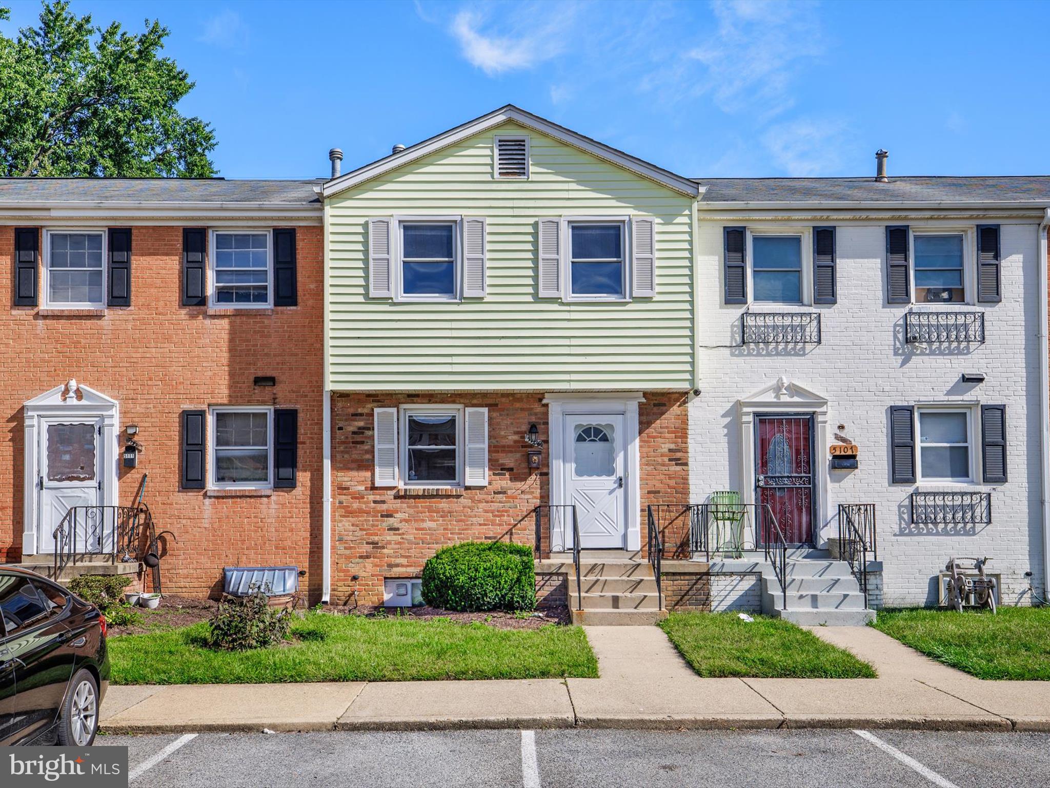 5109 Clacton Avenue, Unit 78 Suitland, MD 20746 - Photo 1 of 33 a front view of a house with garden