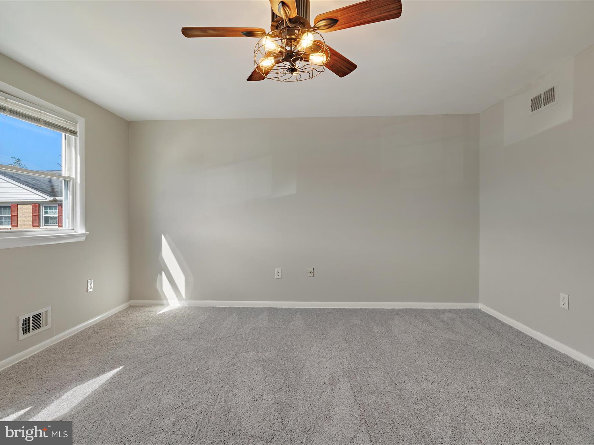 5109 Clacton Avenue, Unit 78 Suitland, MD 20746 - Photo 17 of 33 a view of an empty room with window